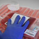 Above, a doctor prepares to modify the T cells of a cancer patient for CAR T cell therapy.